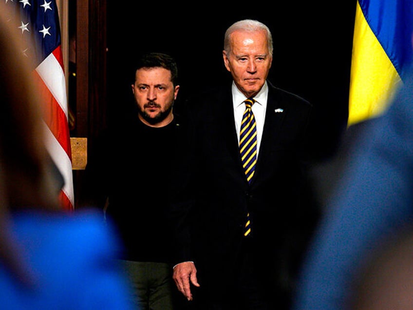 US President Joe Biden, right, and Volodymyr Zelenskiy, Ukraine's president, arrive during