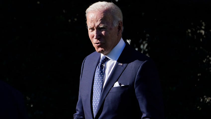 President Biden walks back to the Oval Office after speaking to the 2020 and 2021 State and National Teacher of the Year recipients during an event on the South Lawn of the White House in Washington, Monday, Oct. 18, 2021. (AP Photo/Susan Walsh)