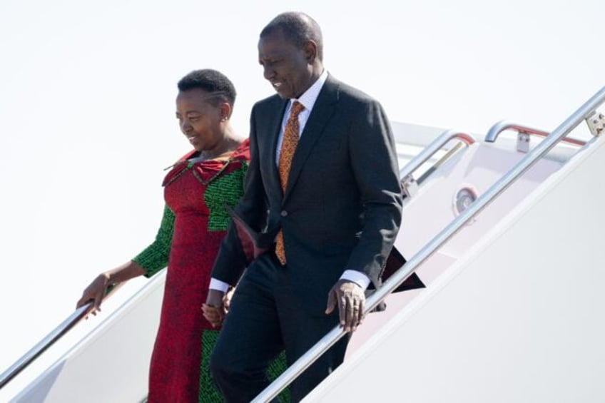 Kenyan President William Ruto and his wife, First Lady Rachel Ruto, disembark from their a