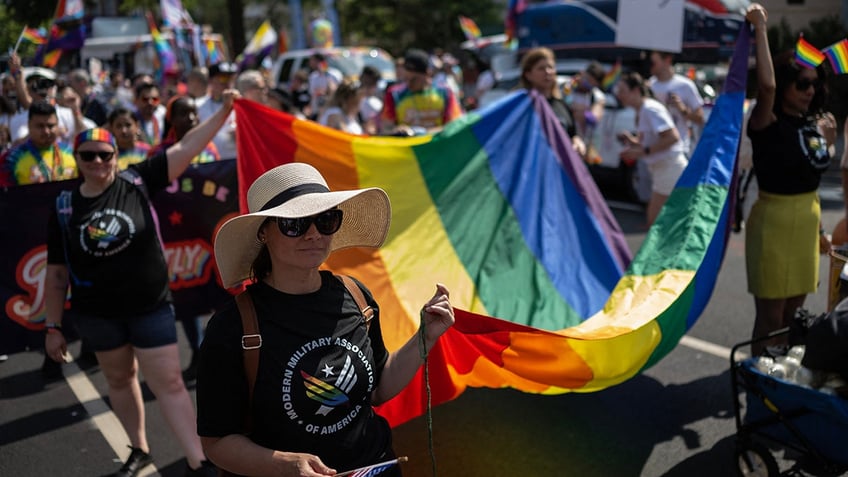U.S. service members march in Pride parade