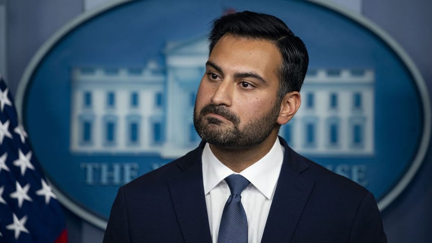 Ali Zaidi, deputy national climate advisor, listens during a news conference in the James S. Brady Press Briefing Room at the White House in Washington, D.C., U.S., on Thursday, Dec. 16, 2021. The Biden administration is preparing to impose more stringent limits on car and truck emissions in an effort to clamp down on a top U.S. source of the greenhouse gases fueling climate change. Photographer: Al Drago/Bloomberg