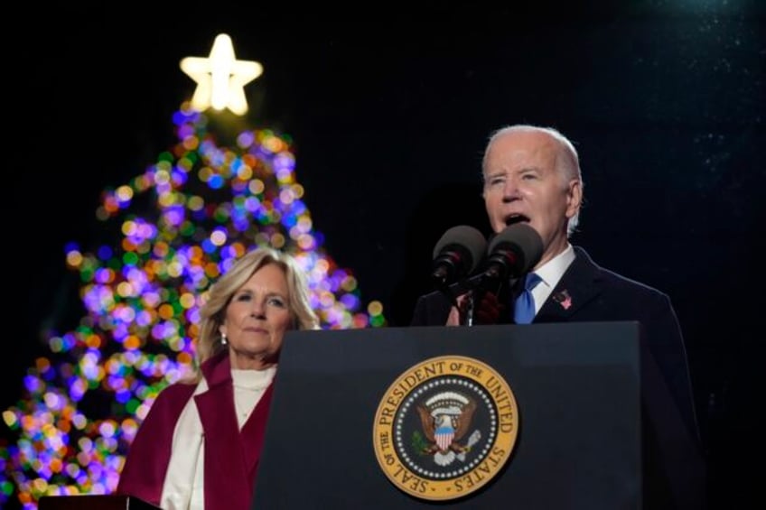 biden lights the national christmas tree taking his turn to bring holiday spirit to washington