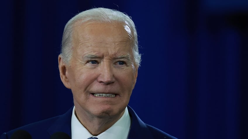 Biden grimacing