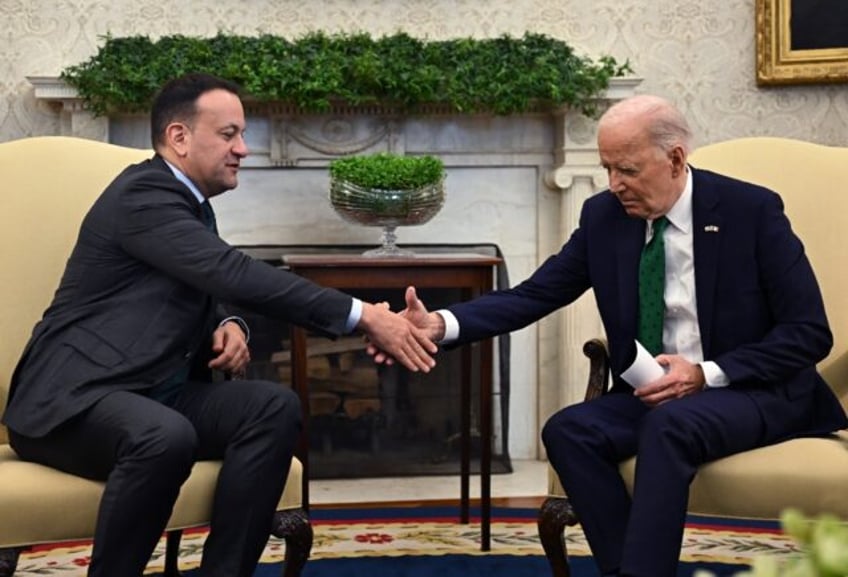 US President Joe Biden shakes hands with Irish Taoiseach Leo Varadkar during a meeting in