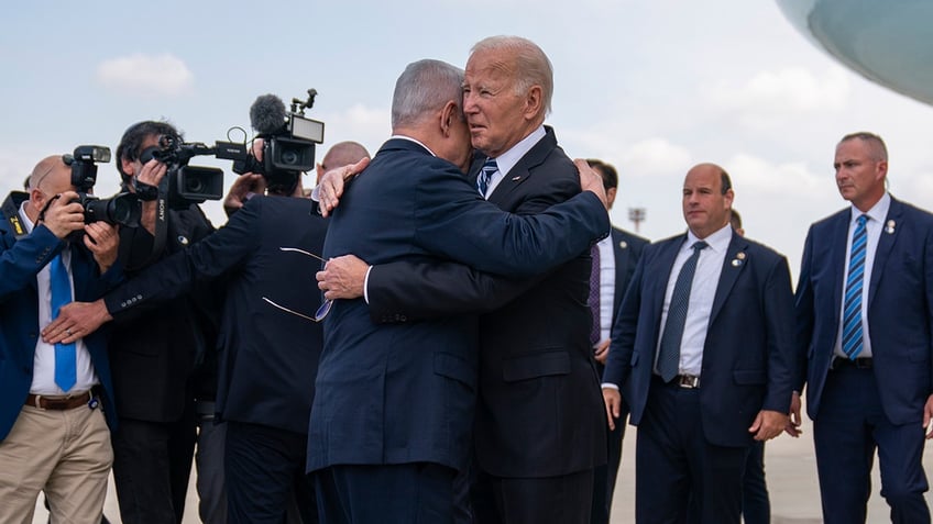 biden puts condition on humanitarian aid to gaza as israel allows egypt to deliver supplies