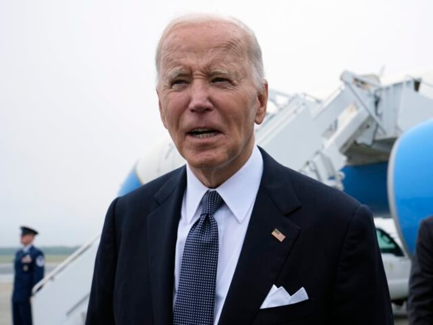 President Joe Biden speaks the the media after stepping off Air Force One at Dover Air For