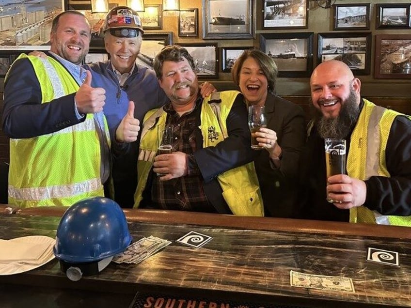 Joe Biden backwards hardhat Amy Klobuchar