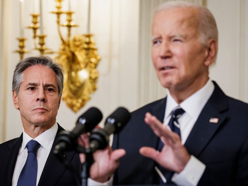 WASHINGTON, DC - OCTOBER 7: Secretary of State Antony Blinken stands alongside President Joe Biden as he delivers remarks on the terrorist attacks in Israel from the State Dining Room at the White House on October 7, 2023 in Washington, DC. The White House has said that senior national security officials have briefed the President on the attacks on Israel that were carried out by Hamas overnight and White House officials remain in close contact with their counterparts in Israel. (Photo by Samuel Corum/Getty Images)