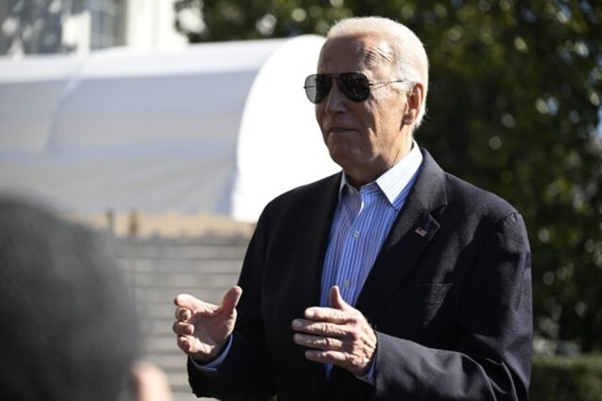 US President Joe Biden speaks to reporters before boarding Marine One at the White House o