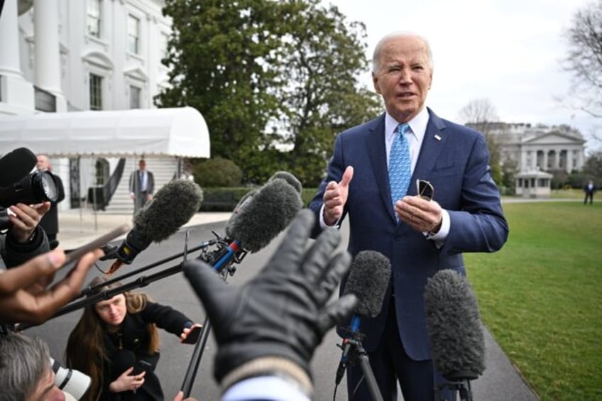 US President Joe Biden speaks to reporters before boarding Marine One on the South Lawn of the White House