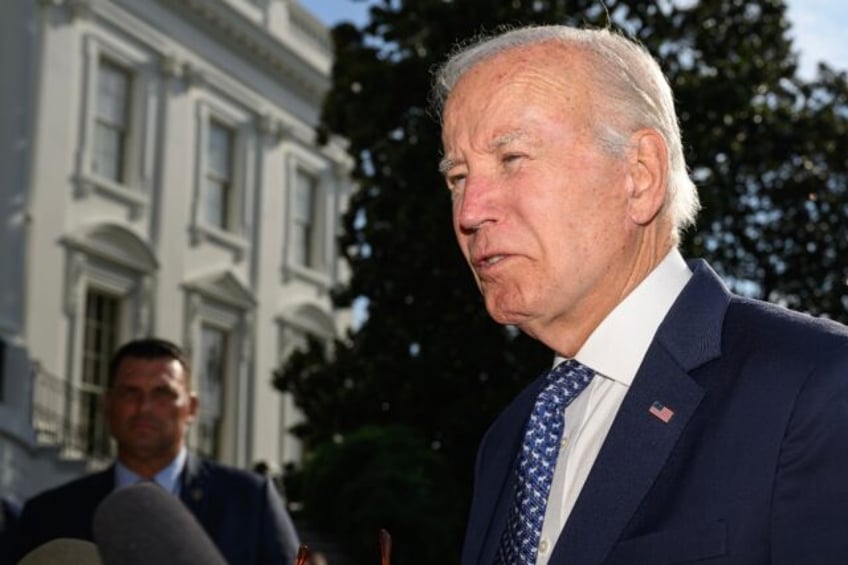 US President Joe Biden speaks with reporters after returning to the White House on Septemb