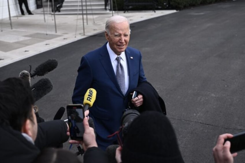 US President Joe Biden speaks to reporters before boarding Marine One on the South Lawn of the White House