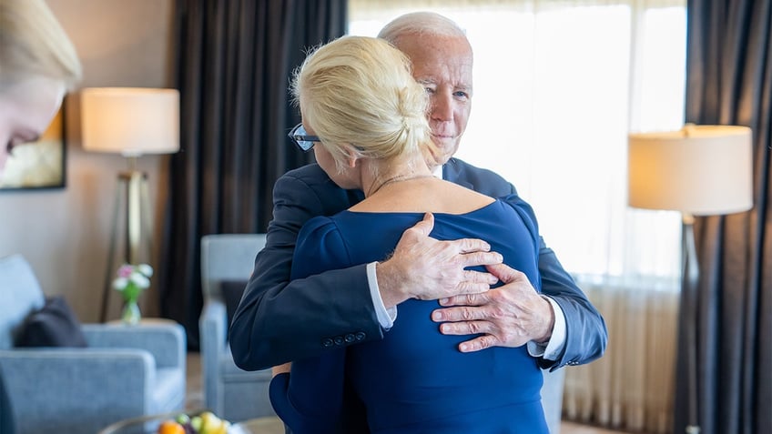 Biden hugs Yulia Navalnaya