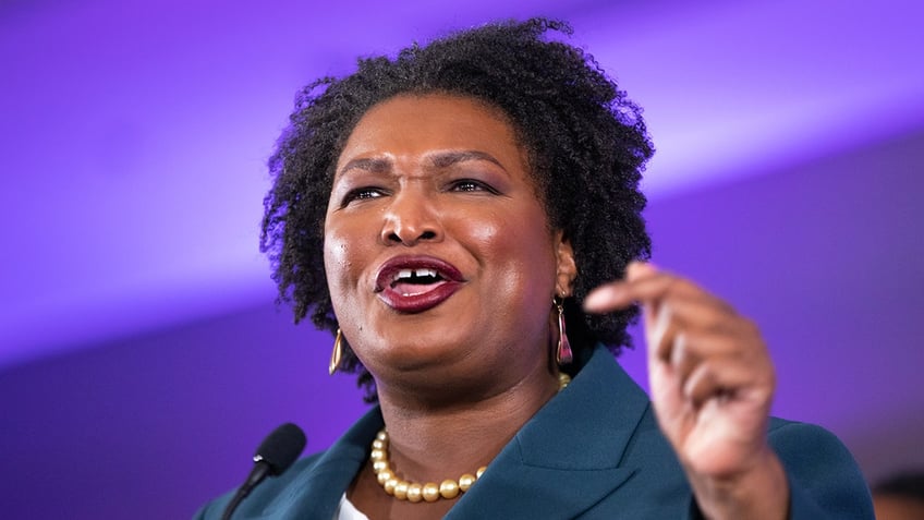 Stacey Abrams at microphone