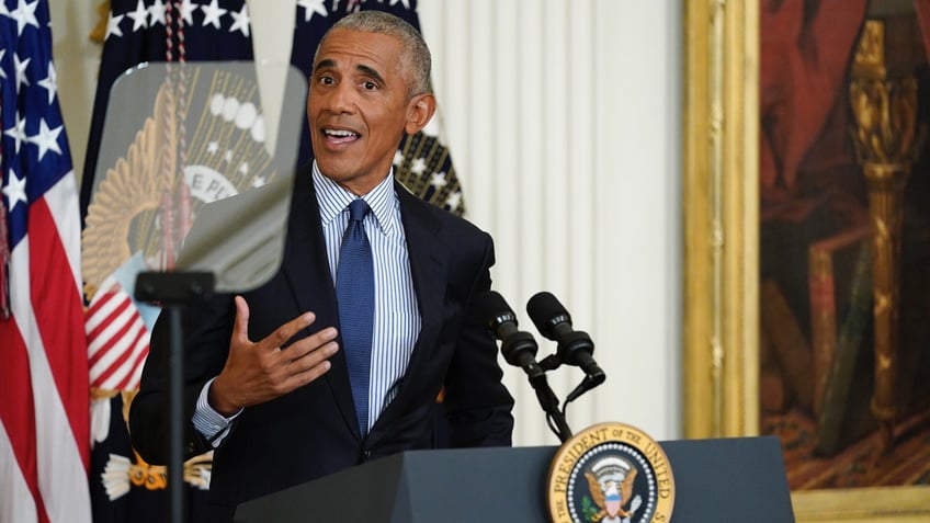 Barack Obama with teleprompter screen at White House