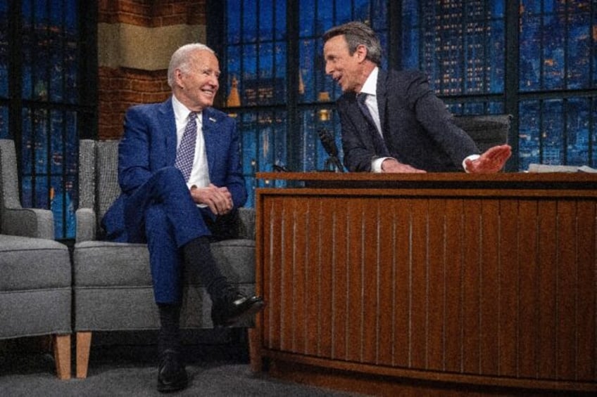 US President Joe Biden speaks with host Seth Meyers during a taping of "Late Night with Se