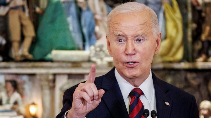 Biden wags finger at White House Christmas party