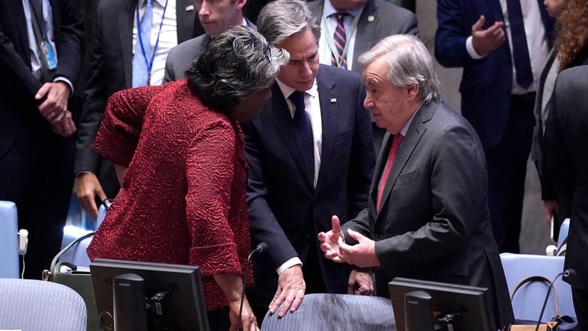 Secretary of State Antony Blinken, center, speaks with United Nations Secretary-General Antonio Guterres and U.S. Ambassador to the U.N. Linda Thomas-Greenfield before the start of a Security Council meeting at U.N. headquarters in New York City on Oct. 24, 2023.