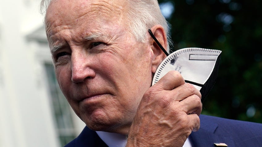 biden to mask up indoors again after negative covid test