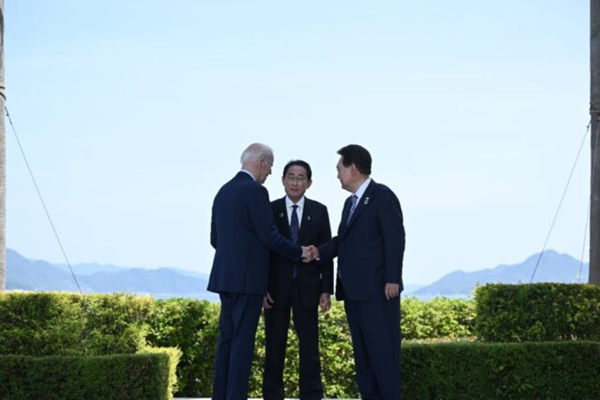 biden to ramp up three way japan skorea ties in sign to china