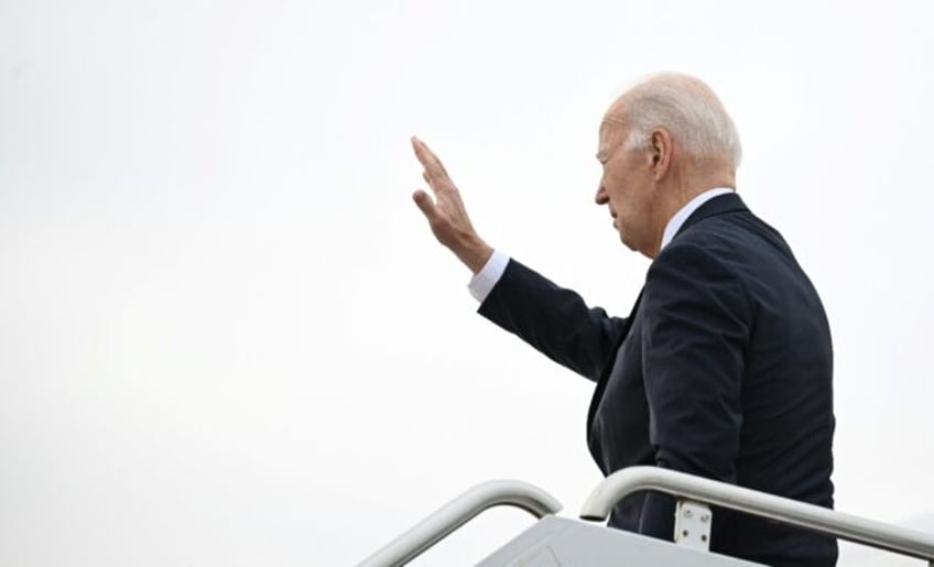 US President Joe Biden boards Air Force One before departing Delaware Air National Guard Base in New Castle, Delaware on January 8, 2024. Biden is heading to Charleston, South Carolina and Dallas, Texas.