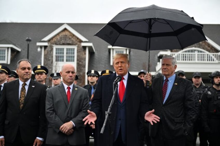 Former US president Donald Trump speaks to the press after attending the wake for New York