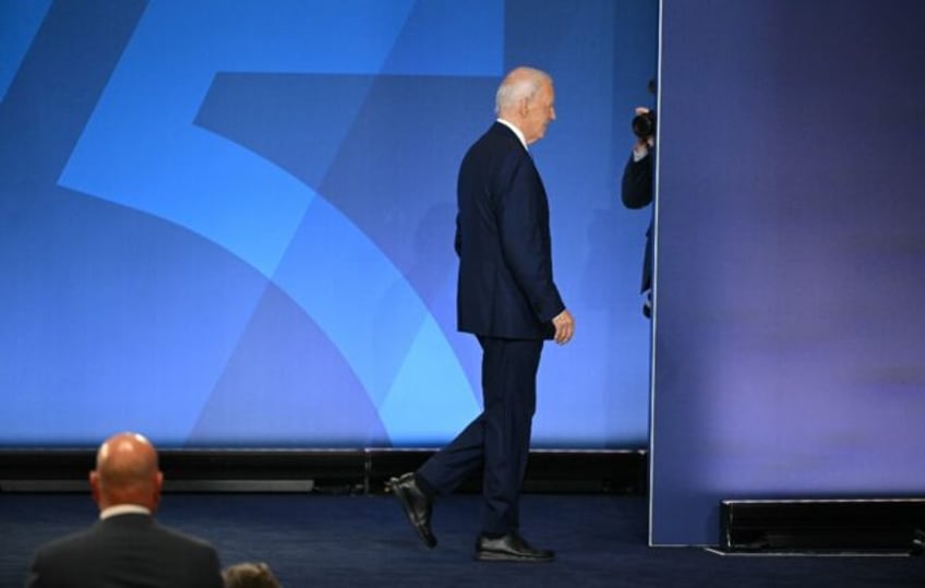 US President Joe Biden leaves after speaking at a press conference at the close of the NAT