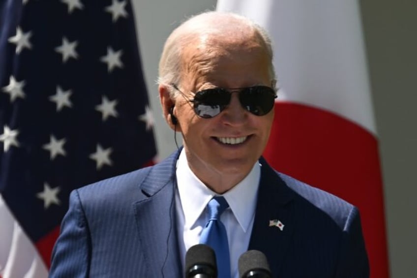 US President Joe Biden smiles during a joint press conference with Japanese Prime Ministe
