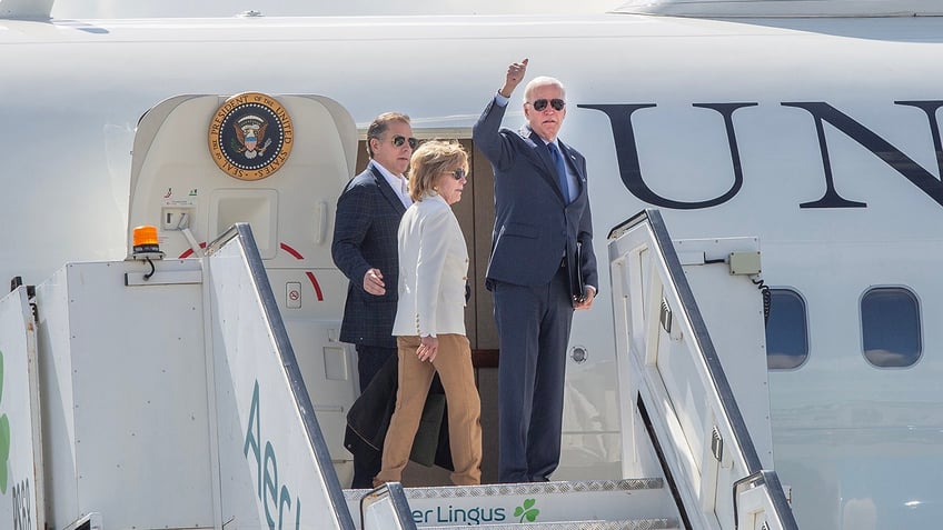 biden using lower stairs on air force one to avoid embarrassing tripping incidents report