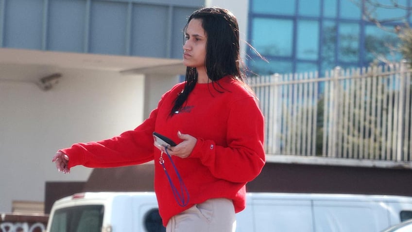 Venezuelan migrant wife of suspected killer of Laken Riley, Jose Ibarra is seen in a red sweater in Queens