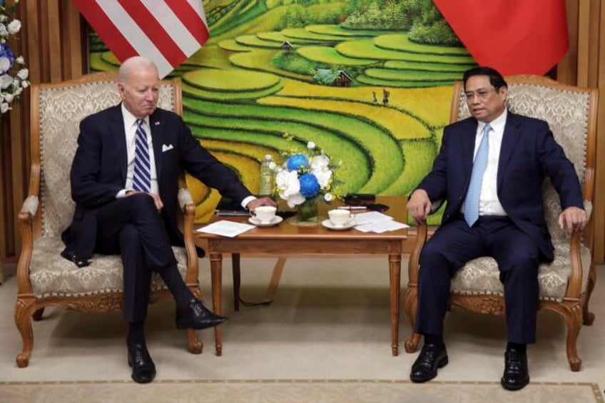 biden wraps vietnam visit by talking with business leaders and visiting a memorial to john mccain