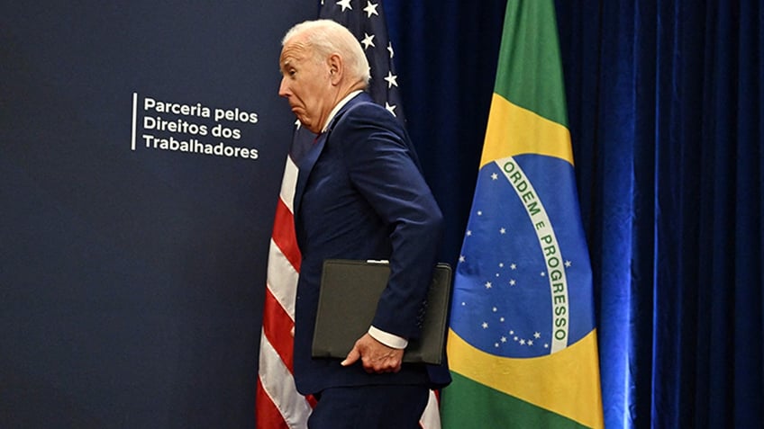 bidens 2024 team is on a mission to stop him from tripping amid struggle with significant spinal arthritis