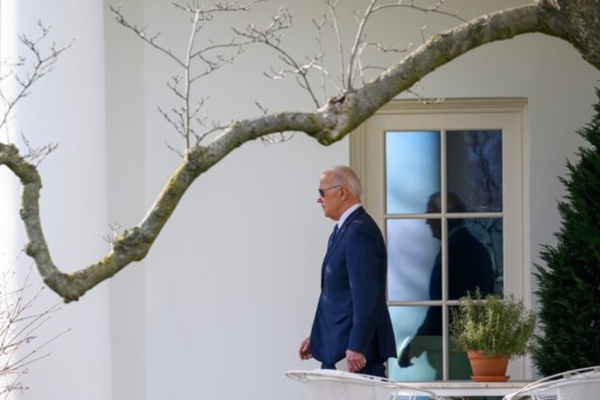 US President Joe Biden makes his way to board Marine One from the South Lawn of the White