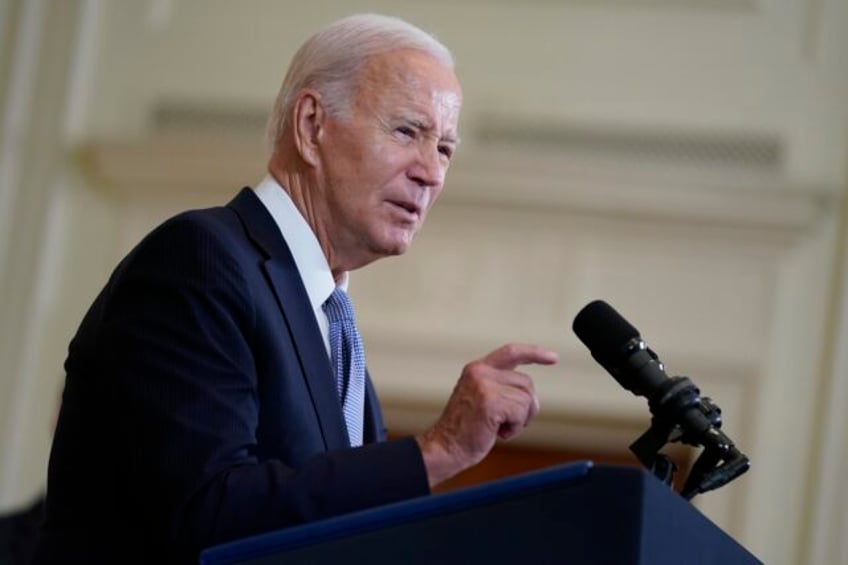 bidens approval rating on the economy stagnates despite slowing inflation ap norc poll shows