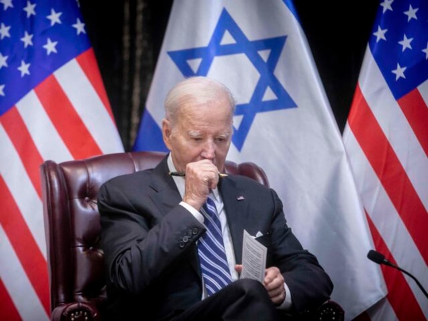 FILE - U.S. President Joe Biden pauses during a meeting with Israeli Prime Minister Benjamin Netanyahu to discuss the war between Israel and Hamas, in Tel Aviv, Israel, Oct. 18, 2023. (Miriam Alster/Pool Photo via AP, File)