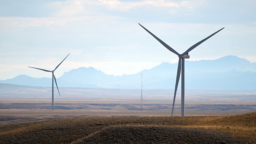Wind electric power generation turbines generate electricity outside Medicine Bow, Wyoming on August 14, 2022.
