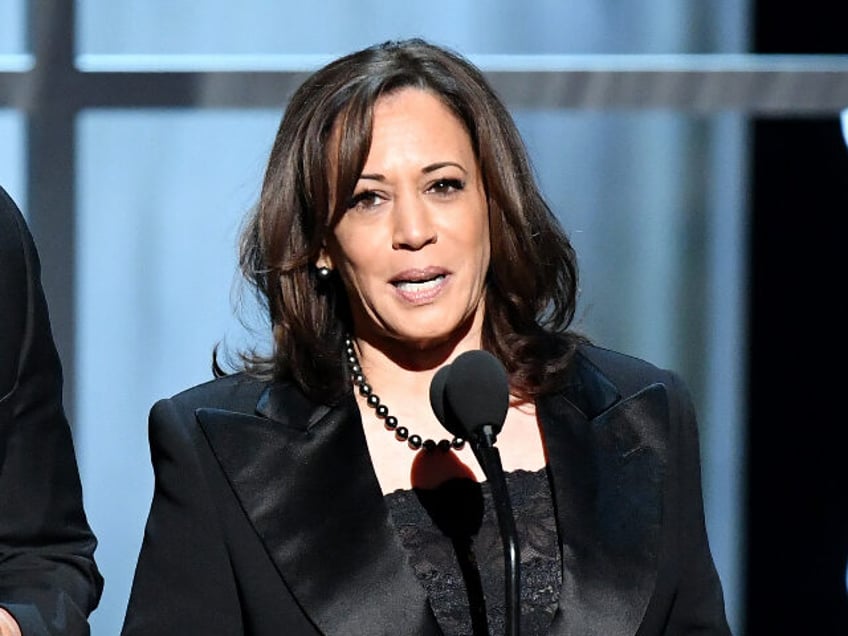 HOLLYWOOD, CALIFORNIA - MARCH 30: (L-R) Cory Booker and Kamala Harris speak onstage at the