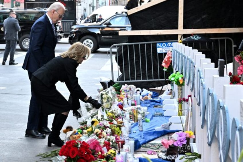 Joe and Jill Biden paid their respects to the 14 people killed in a truck-ramming attack i