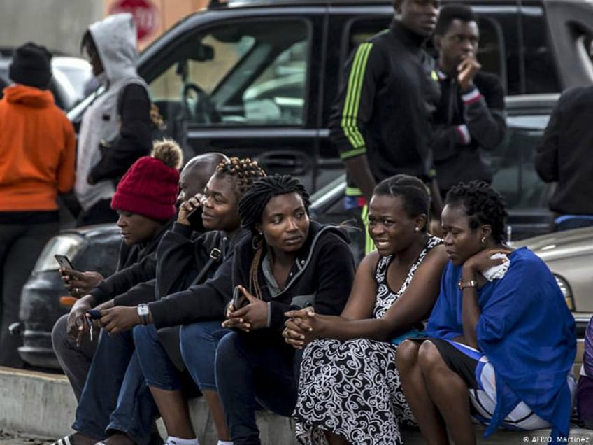 A group of migrants, mostly from African countries, wait to request an appointment with US migration authorities outside El Chaparral port of entry, in Tijuana, Baja California state, Mexico, on July 17, 2019. (Photo by OMAR MARTÍNEZ / AFP) (Photo credit should read OMAR MARTINEZ/AFP/Getty Images)