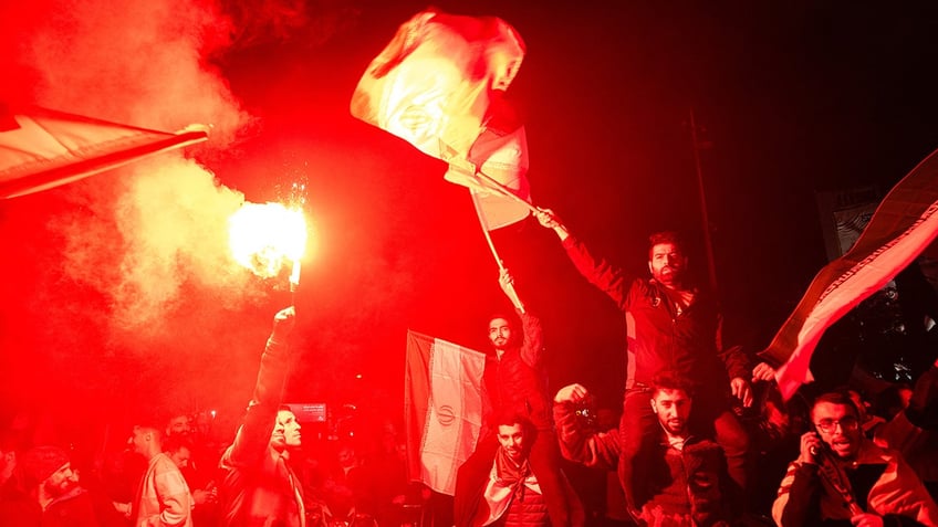 Iranian government supporters in Palestine Square