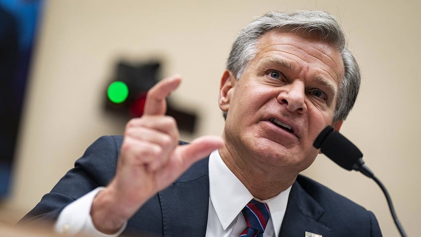 Christopher Wray testifying before Congress closeup shot