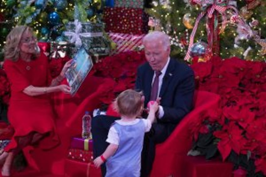 Bidens spread holiday cheer with visit to D.C. children's hospital