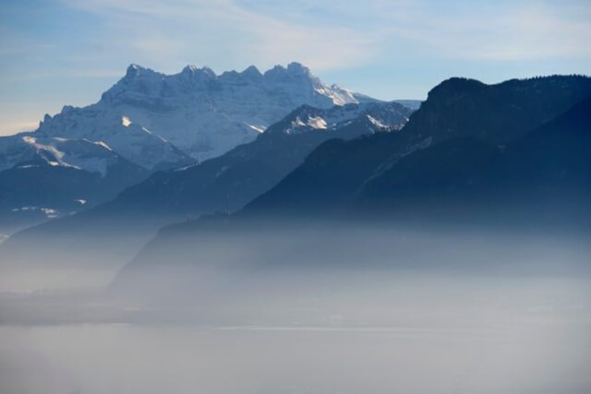 Smog is pictured over Lake Geneva in Switzerland in February 2017