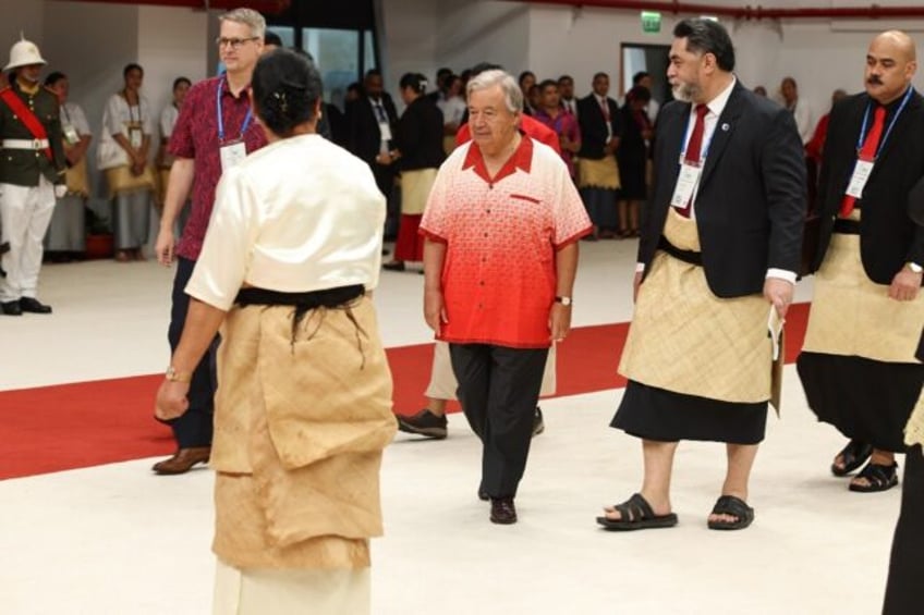 United Nations Secretary-General Antonio Guterres (C) attends the Pacific Islands Forum in