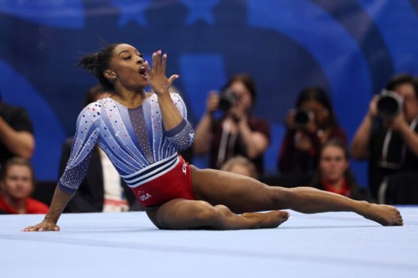 Simone Biles competes in the floor exercise at the US Olympic gymnastics trials