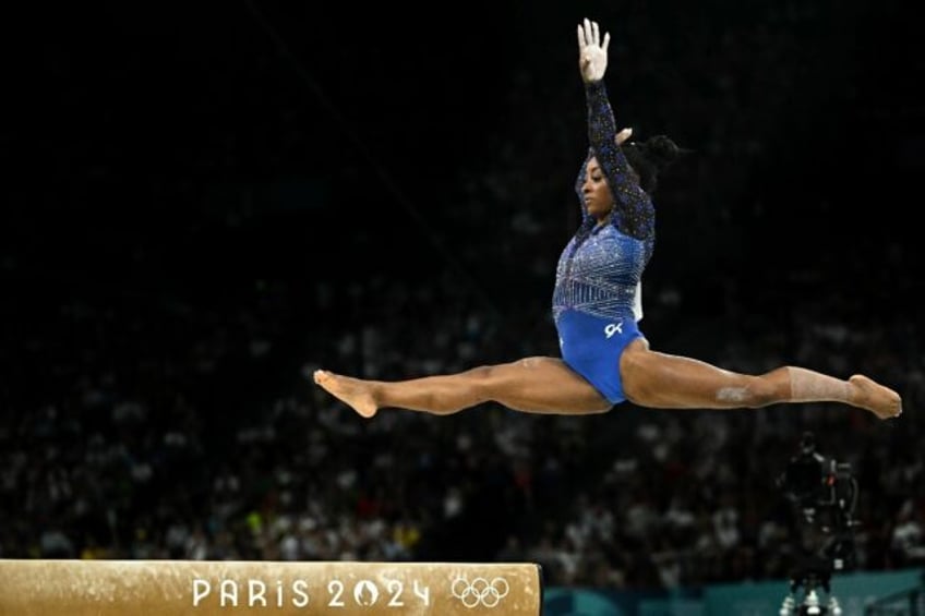 Simone Biles reclaimed the Olympic women's all-around title at the Paris Olympics