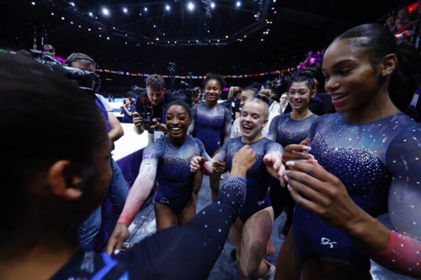 biles wins 20th world title as us women seal team gold