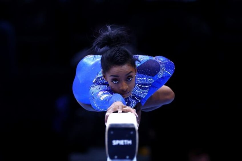 biles wins 21st world title with all around gymnastics gold