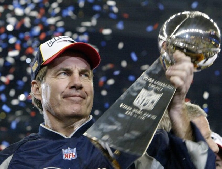 Bill Belichick holds the Vince Lombardi trophy after New England's 2004 Super Bowl win