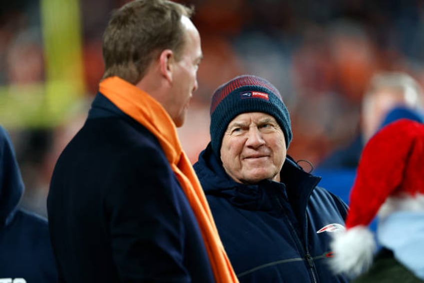 Denver, CO New England Patriots head coach Bill Belichick chats with former Denver Broncos QB Peyton Manning before the game. The Patriots beat the...